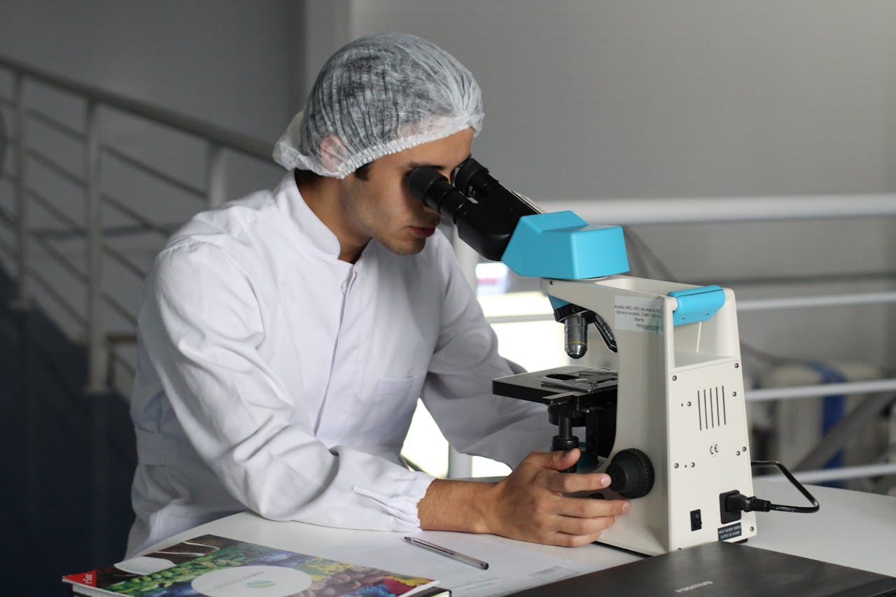 skin cancer biopsy reviewed on microscope